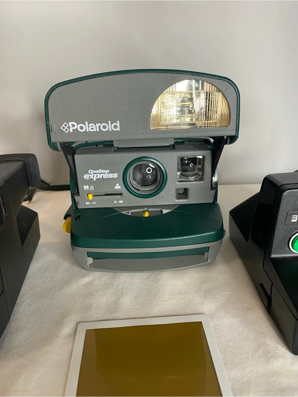 Polaroid Vintage OneStep 600 & Land Camera in Black & One Step Express in Green